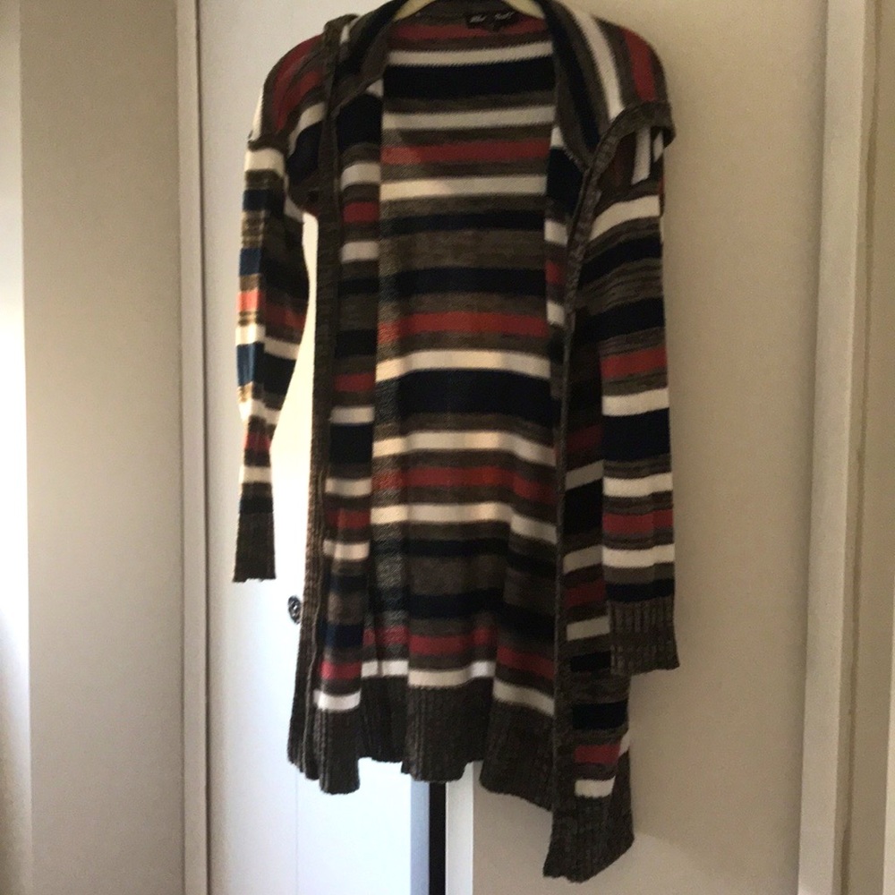 Long sleeve multi color cardigan wit a hood.